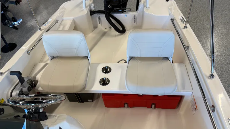 Slide: The Image of Interior of 2026 Boston Whaler 160 Super Sport with white seats. - 8