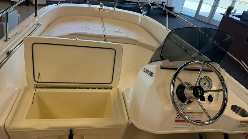 Slide: The Image of Interior view of 2026 Boston Whaler 160 Super Sport boat. - 9