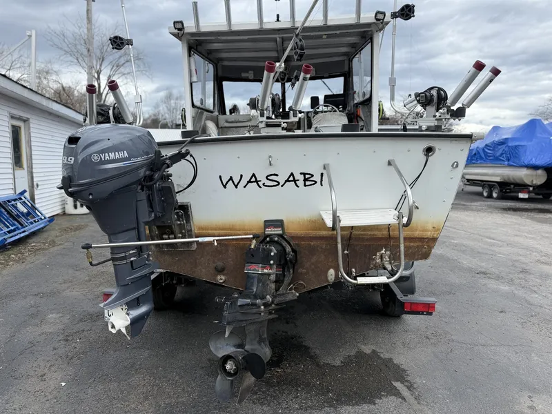 Slide: The Image of 1993 Starcraft Islander 191 boat with Yamaha outboard motor. - 2