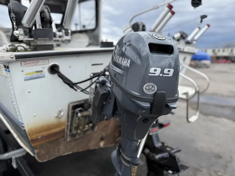 Slide: The Image of Yamaha 9.9 outboard motor on a 1993 Starcraft Islander 191 boat. - 3