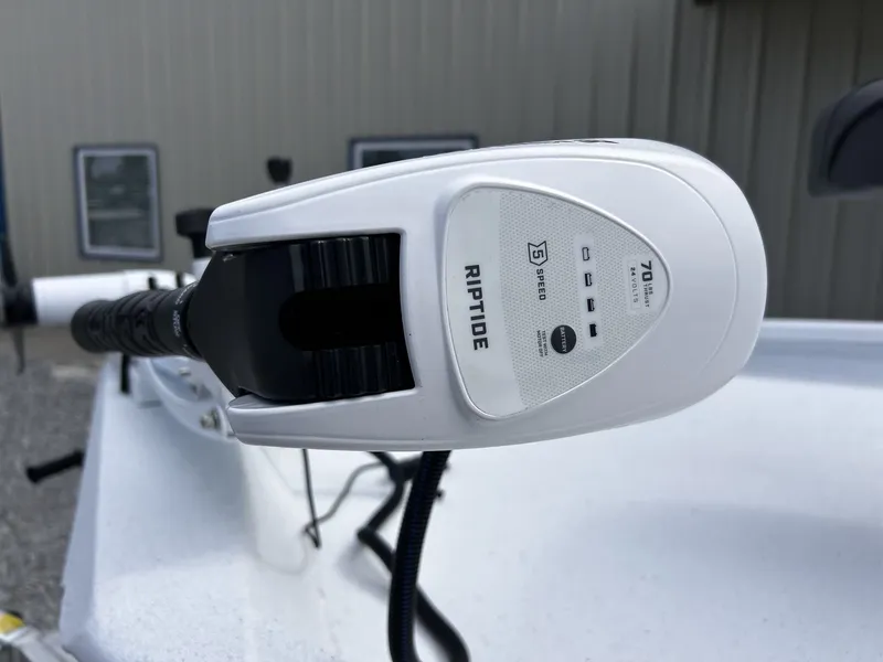 Slide: The Image of Close-up of a Riptide motor on a 2026 Xpress H22B Bay boat. - 13