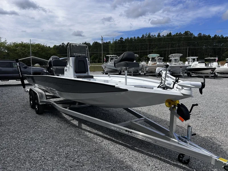 Slide: The Image of 2026 Xpress H22B Bay boat on trailer outdoors. - 3