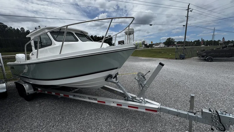 Slide: The Image of Parker 247 Explorer 2026 on trailer, ready for adventure. - 3