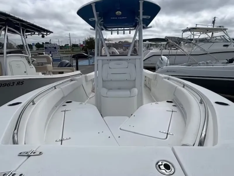 Slide: The Image of 2016 Sea Hunt 234 Ultra boat in harbor, front view. - 10