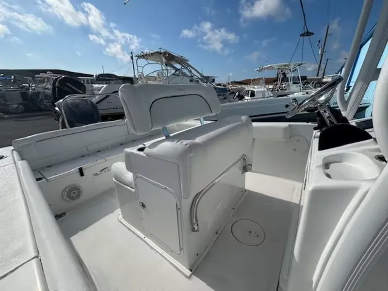 Slide: The Image of Interior view of a 2016 Sea Hunt 234 Ultra boat in harbor. - 6