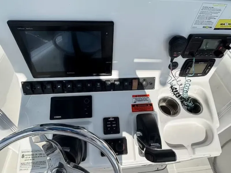 Slide: The Image of 2016 Sea Hunt 234 Ultra boat console with electronics. - 7