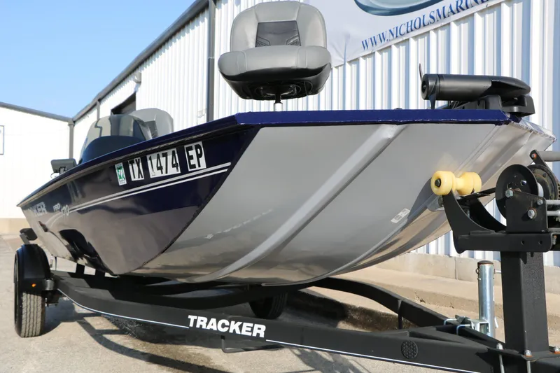 Slide: The Image of 2019 Tracker Pro 170 boat on trailer outside warehouse. - 5