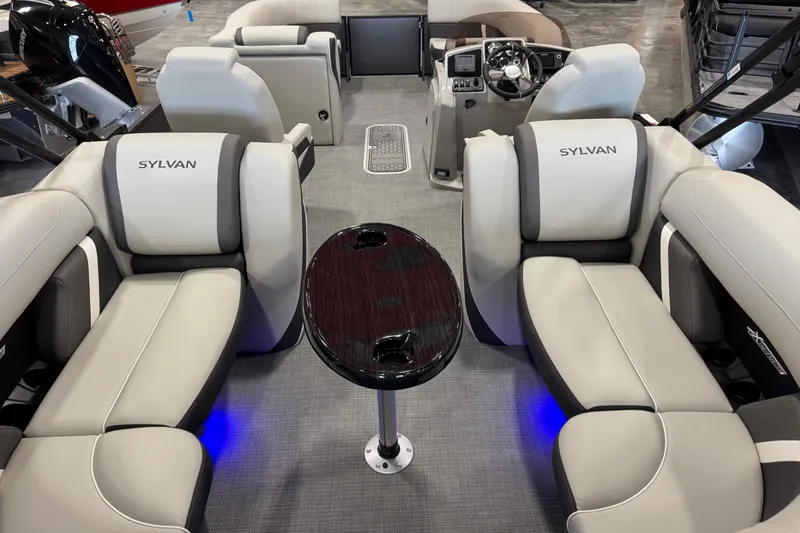 Slide: The Image of Luxurious interior of 2026 Sylvan Mirage X X5 pontoon boat with plush seating and modern dashboard. - 6