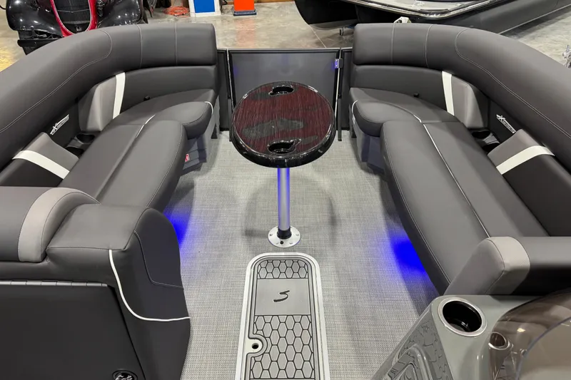 Slide: The Image of Luxurious interior of 2026 Sylvan X5 boat with sleek seating and ambient lighting. - 9