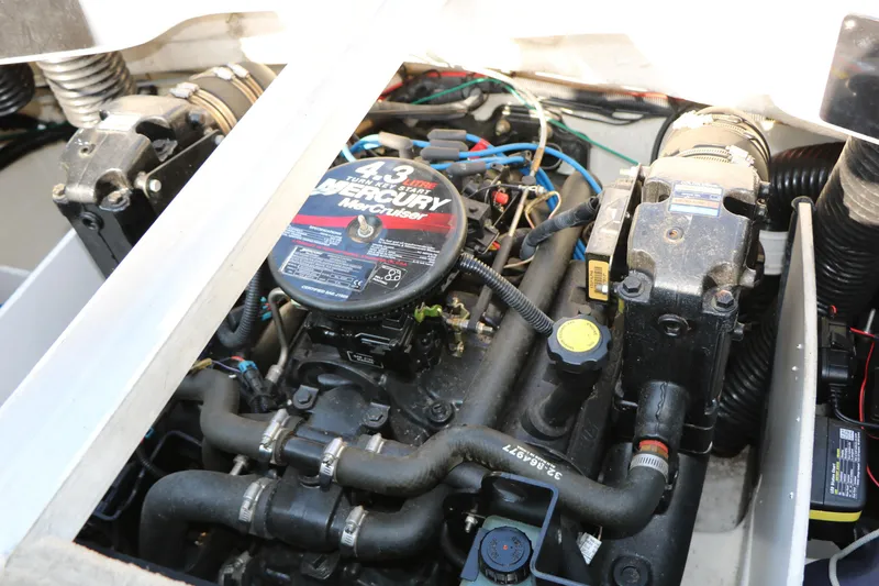 Slide: The Image of Engine compartment of a 2006 Sea Ray 185 Sport boat with a 4.3L MerCruiser engine. - 45