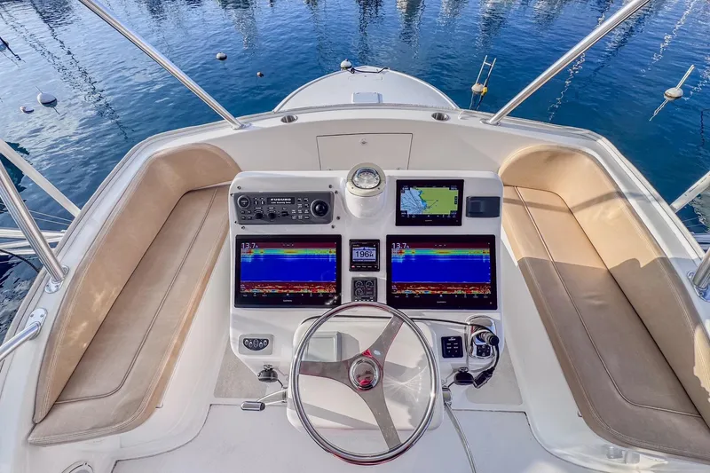 Slide: The Image of Cockpit of 2017 Viking 37 Billfish with advanced navigation and control systems. - 12