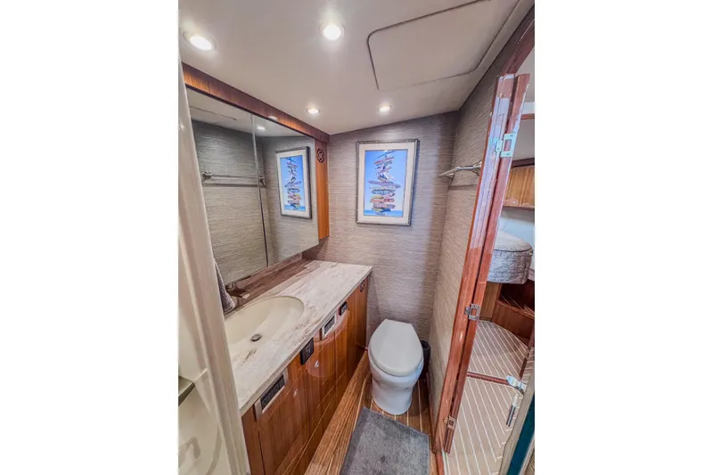 Slide: The Image of Luxurious bathroom in 2017 Viking 37 Billfish yacht with modern fixtures and elegant design. - 19