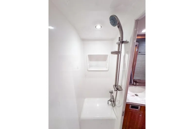 Slide: The Image of Shower area in 2017 Viking 37 Billfish yacht, featuring modern fixtures and sleek design. - 21