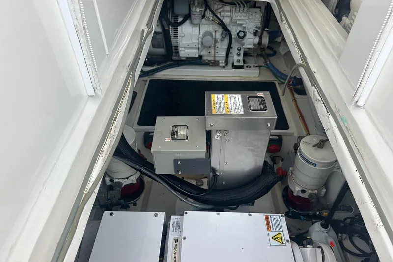 Slide: The Image of Engine room of 2017 Viking 37 Billfish, showcasing mechanical components and equipment. - 22