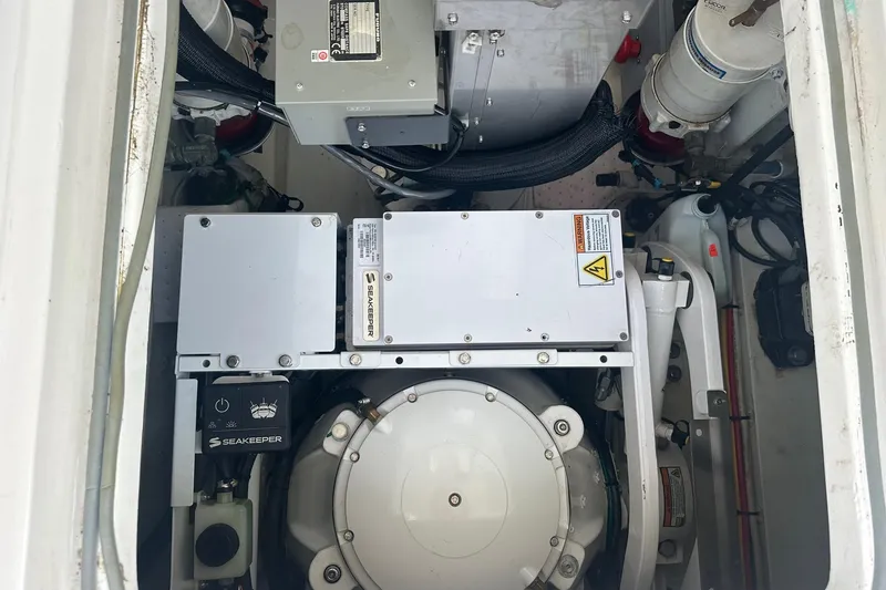 Slide: The Image of Engine compartment of a 2017 Viking 37 Billfish with Seakeeper stabilizer system. - 27