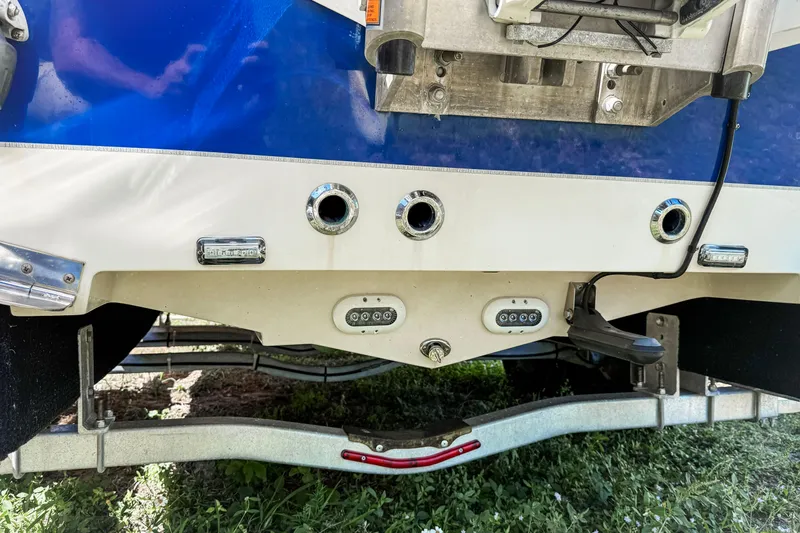 Slide: The Image of Rear view of a 2019 Sea Chaser 24 HFC boat on a trailer. - 16