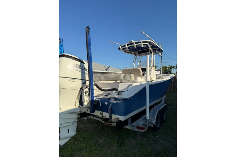 Slide: The Image of 2019 Sea Chaser 24 HFC boat on trailer with Suzuki outboard motor. - 5