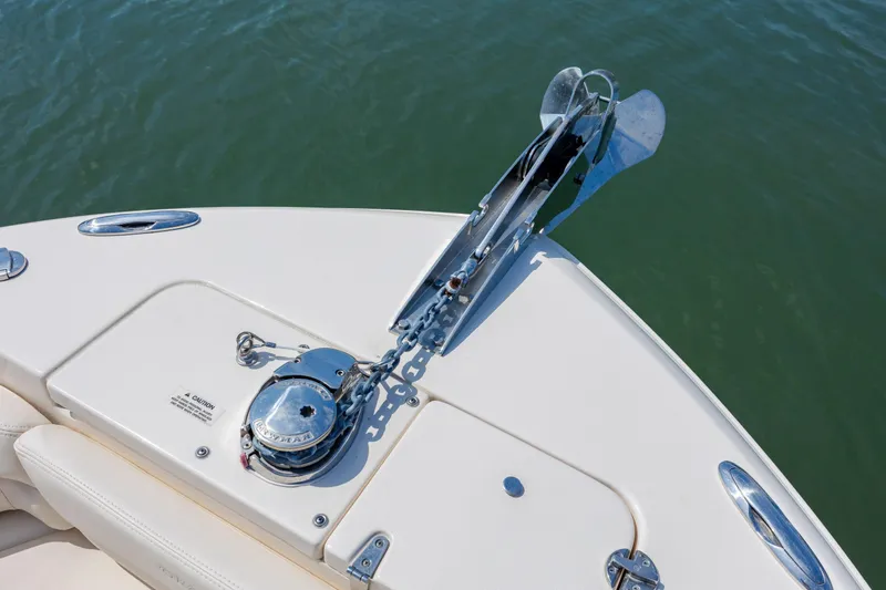 Slide: The Image of 2024 Grady-White Fisherman 236 boat anchor system on calm water. - 22