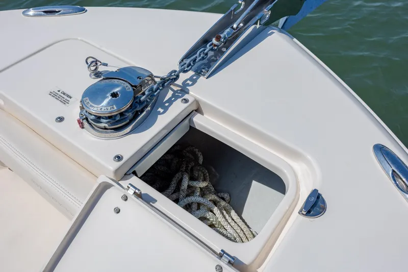 Slide: The Image of 2024 Grady-White Fisherman 236 anchor locker with chain and rope storage. - 23
