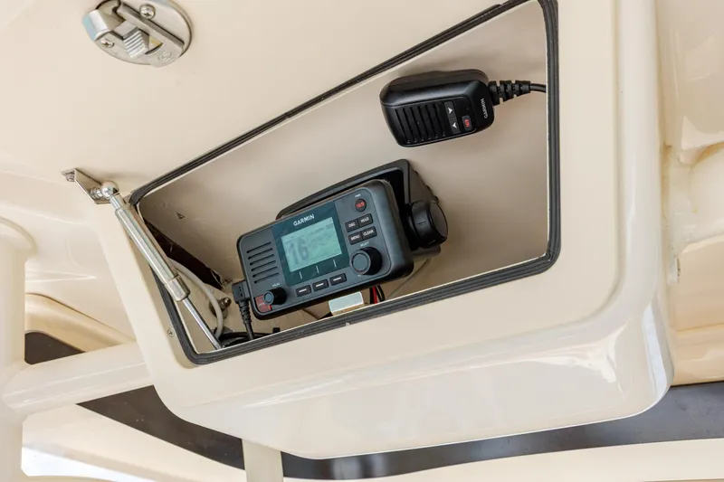 Slide: The Image of 2024 Grady-White Fisherman 236 boat with Garmin radio installed in console. - 35