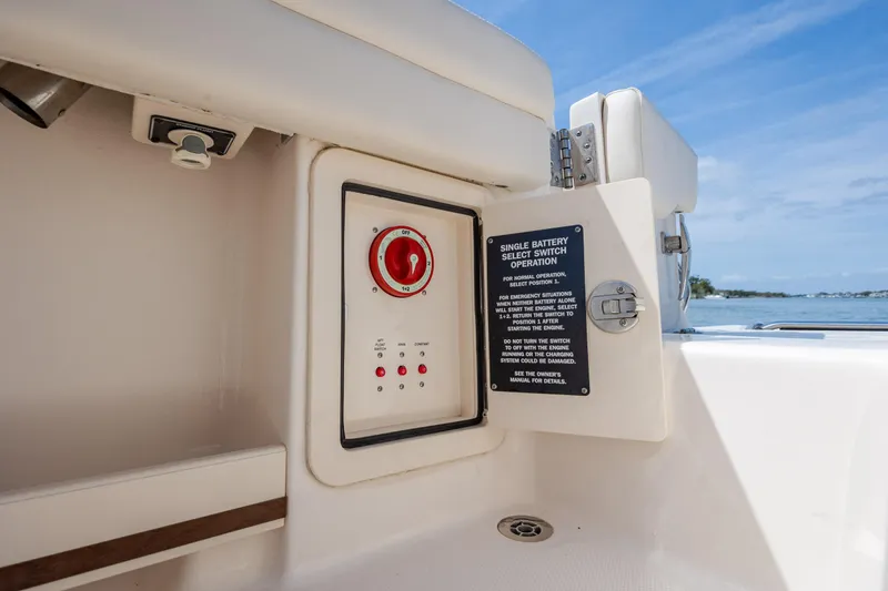 Slide: The Image of 2024 Grady-White Fisherman 236 boat battery switch panel with operation instructions. - 47