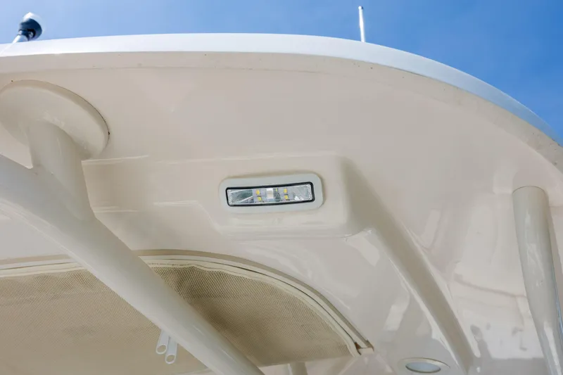 Slide: The Image of 2024 Grady-White Fisherman 236 boat canopy with integrated LED light, viewed from below. - 53