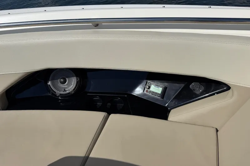 Slide: The Image of Interior view of 2021 Boston Whaler 280 Vantage boat with speaker and control panel. - 14