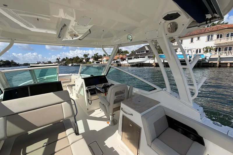 Slide: The Image of Interior view of a 2021 Boston Whaler 280 Vantage boat on the water. - 26