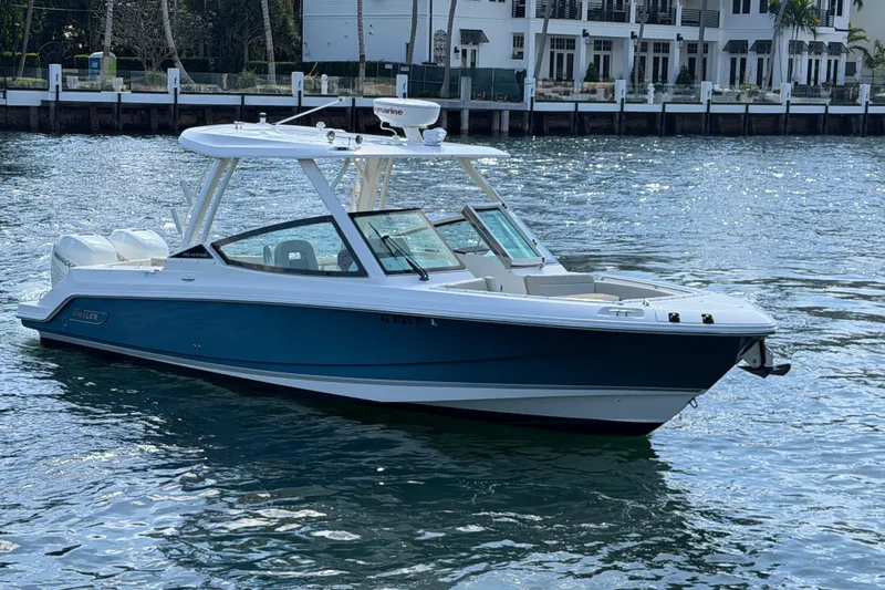 Slide: The Image of 2021 Boston Whaler 280 Vantage boat on water, featuring sleek design and modern amenities. - 31