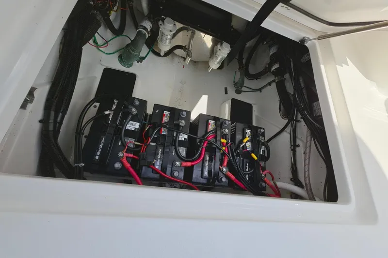 Slide: The Image of Battery compartment of the 2024 Sea Pro 322 Offshore boat. - 12
