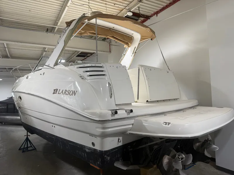 Slide: The Image of 2001 Larson Cabrio 330 boat in storage facility - 13