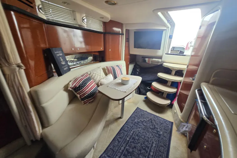 Slide: The Image of Luxurious interior of a 2003 Sea Ray Sundancer 320 yacht with elegant seating and decor. - 2