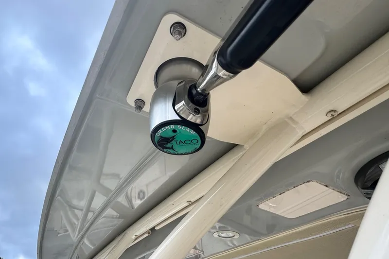 Slide: The Image of Close-up of a 2023 Grady-White Freedom 285 boat's TACO Grand Slam outrigger mount. - 10