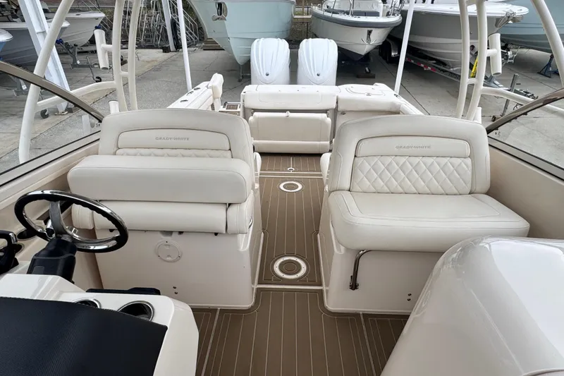 Slide: The Image of 2023 Grady-White Freedom 285 boat interior with luxurious seating and modern design. - 8