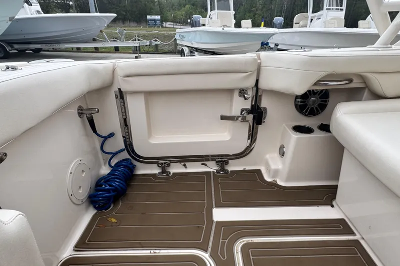 Slide: The Image of Interior of 2023 Grady-White Freedom 285 boat, featuring seating and deck details. - 9