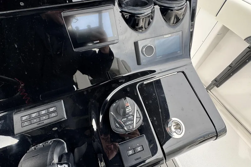 Slide: The Image of Control panel of 2026 Tidewater 302 CC Adventure boat with Yamaha electronics. - 15