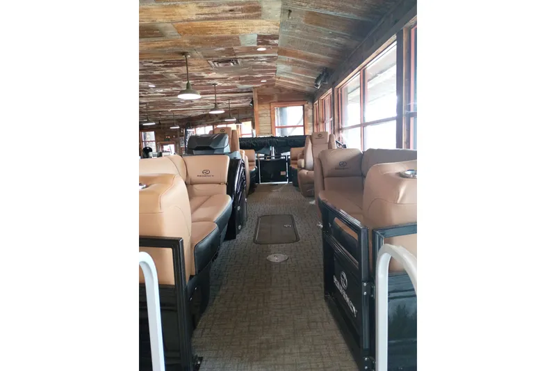 Slide: The Image of Interior of 2026 Regency 230 DL boat with luxurious seating and wooden ceiling. - 4