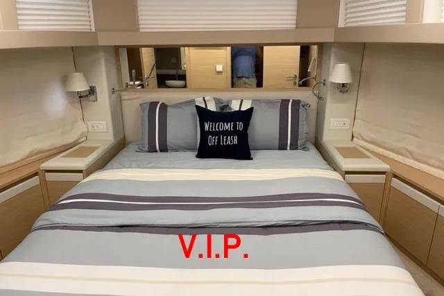 Slide: The Image of Luxurious bedroom in 2022 Greenline 45 Fly yacht with "Welcome to Off Leash" pillow. - 11