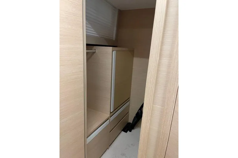 Slide: The Image of Modern interior of 2022 Greenline 45 Fly yacht with sleek wooden cabinetry. - 13