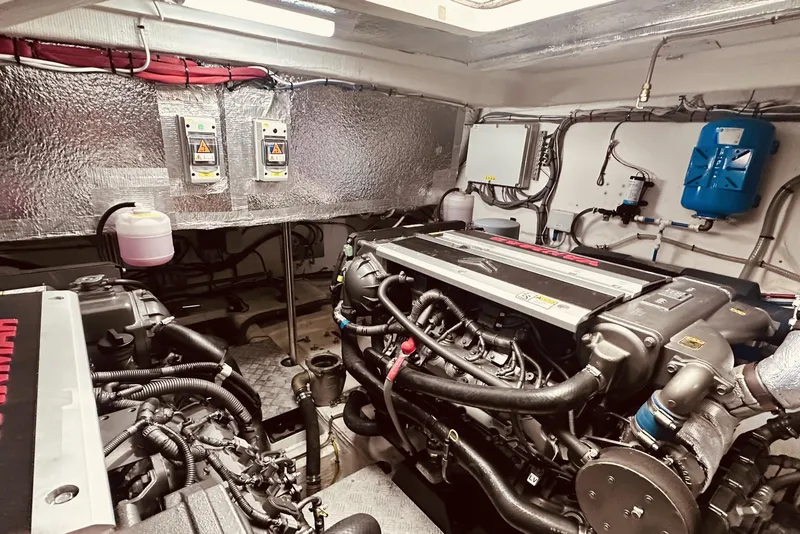 Slide: The Image of Engine room of 2022 Greenline 45 Fly yacht, showcasing advanced machinery and components. - 19
