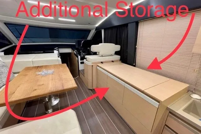 Slide: The Image of Interior of 2022 Greenline 45 Fly yacht showcasing additional storage space. - 2