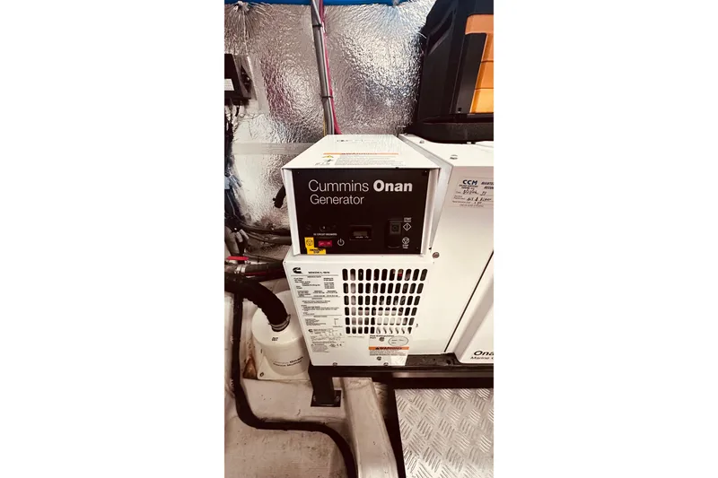 Slide: The Image of Cummins Onan generator in 2022 Greenline 45 Fly yacht engine room. - 21