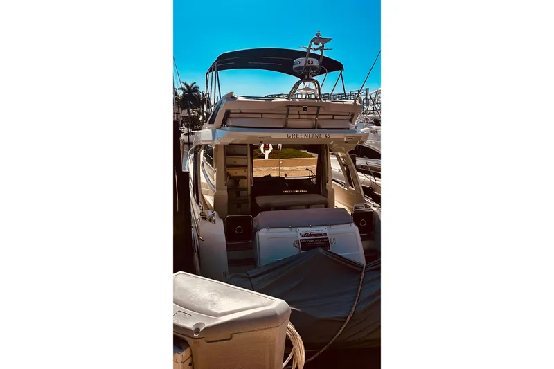 Slide: The Image of 2022 Greenline 45 Fly yacht docked, showcasing sleek design and modern features. - 23