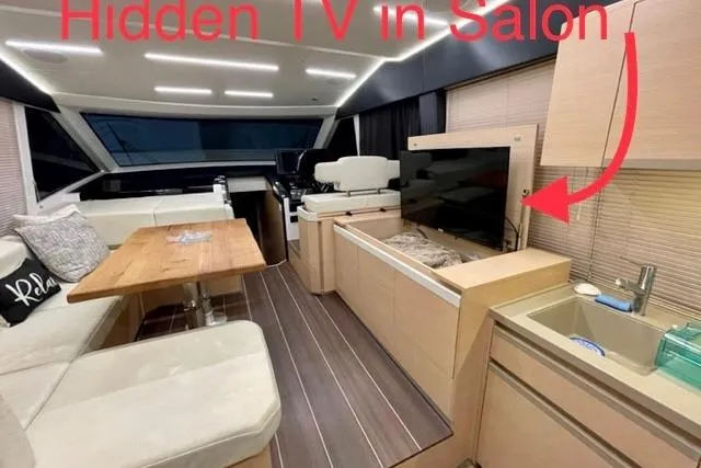 Slide: The Image of Luxurious 2022 Greenline 45 Fly yacht interior with hidden TV in salon. - 3