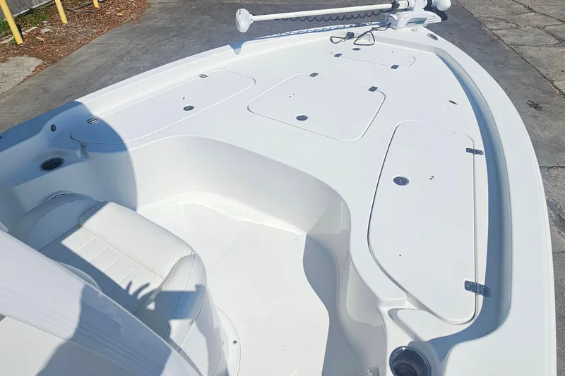 Slide: The Image of 2017 Sea Hunt BX 22 BR boat deck with storage compartments and seating. - 15