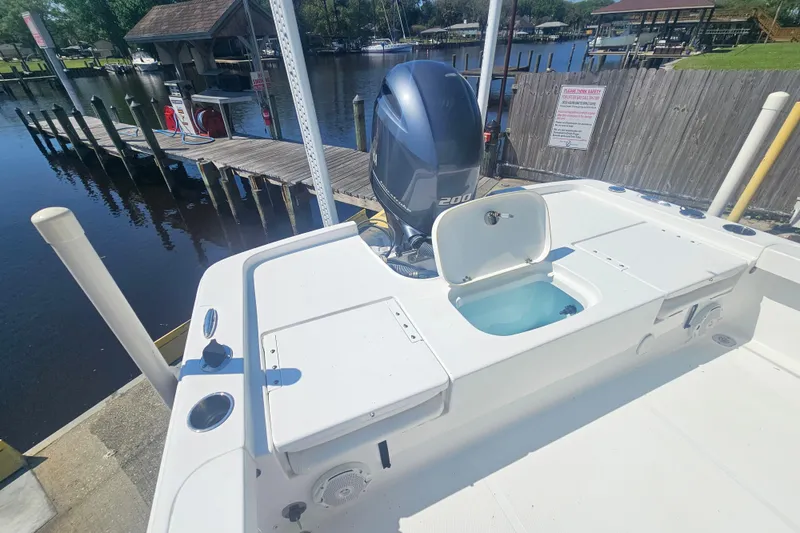 Slide: The Image of 2017 Sea Hunt BX 22 BR boat with Yamaha 200 engine at dockside. - 9