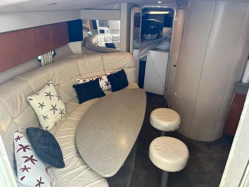 Slide: The Image of Interior of 2001 Formula 41 PC yacht with seating area and table. - 35