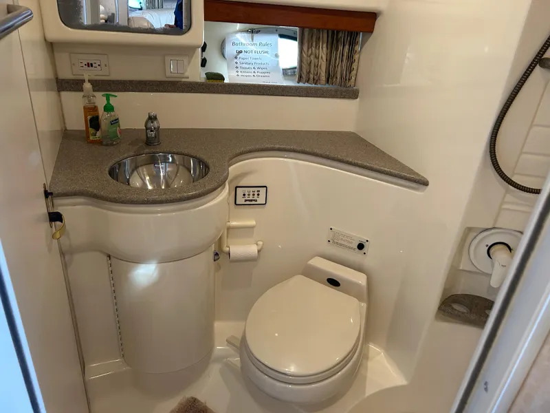 Slide: The Image of Interior of a 2001 Formula 41 Performance Cruiser yacht, bathroom view. - 46