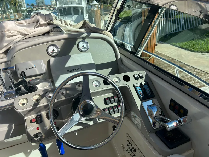 Slide: The Image of Control panel of a 2001 Formula 41 PC boat with Garmin navigation system. - 67