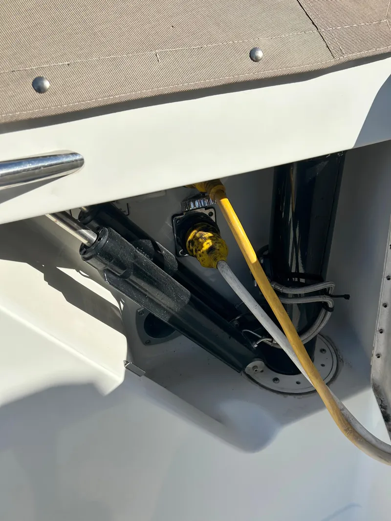 Slide: The Image of 2001 Formula 41 PC boat showing utility connections and cables. - 69